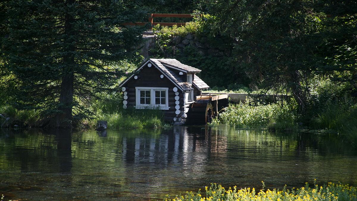 The Johnny Sack Cabin beside the spring at Big Springs
