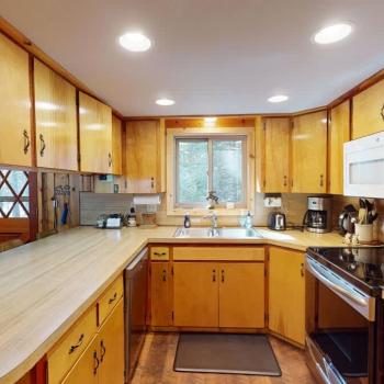 A large kitchen fully equipped for all your needs during your stay.