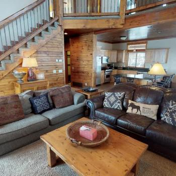 The living room offers a welcome environment to relax after a long day and connect with others.