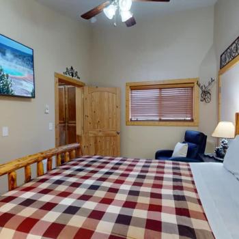 The bedroom brings in natural light to enjoy during your stay.