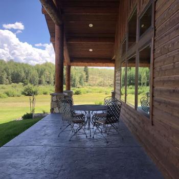 Beautiful deck of the cabin to look out on the beautiful landscape.