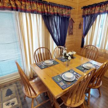 The dining table is perfect to seat up to 6 people with additional seating at the kitchen island.