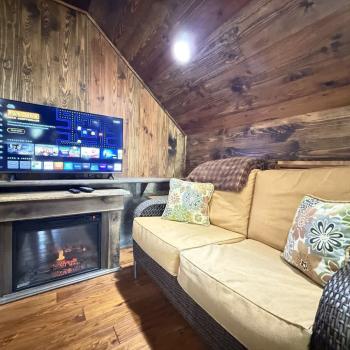 Seating area by the smartTV to relax after a long day.