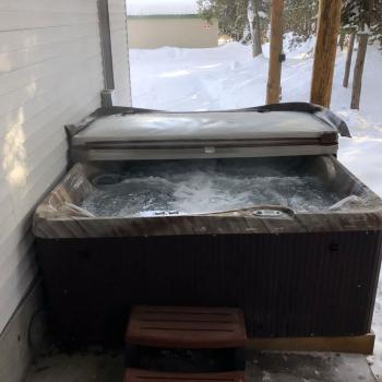 Winchester lodge comes equipped with a hot tub perfect for those cold days.