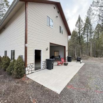 open garage with grill and firepit