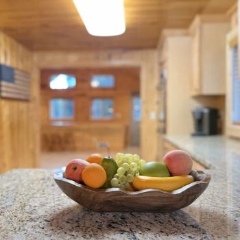 A fruit bowl 0n the counter for those quick to go snacks.