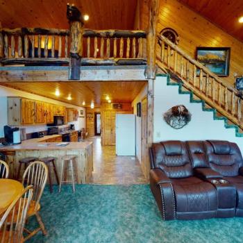 Adjacent to the living room is the dining table and kitchen.