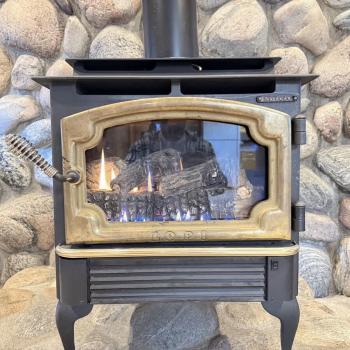 Warm up by the propane fireplace on those chilly summer evenings.