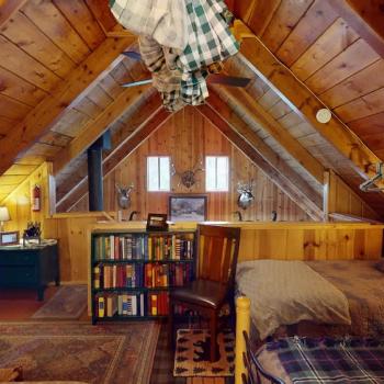 Cozy bedroom area upstairs that sleeps comfortably 3 people.