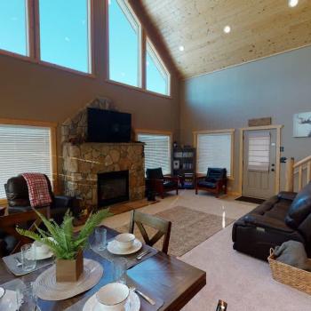 Dining room table is adjacent to the living room and kitchen. Perfect for up to 4 people.