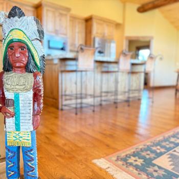 Indian carving with overview of the kitchen