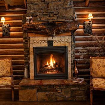 When the night rolls in, pour a glass of wine and sink into the comfortable armchairs next to the beautifully lit, crackling propane gas stone fireplace.