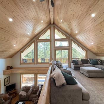 Upstairs open loft. Room for everyone to lounge and watch a movie on the smart tv.
