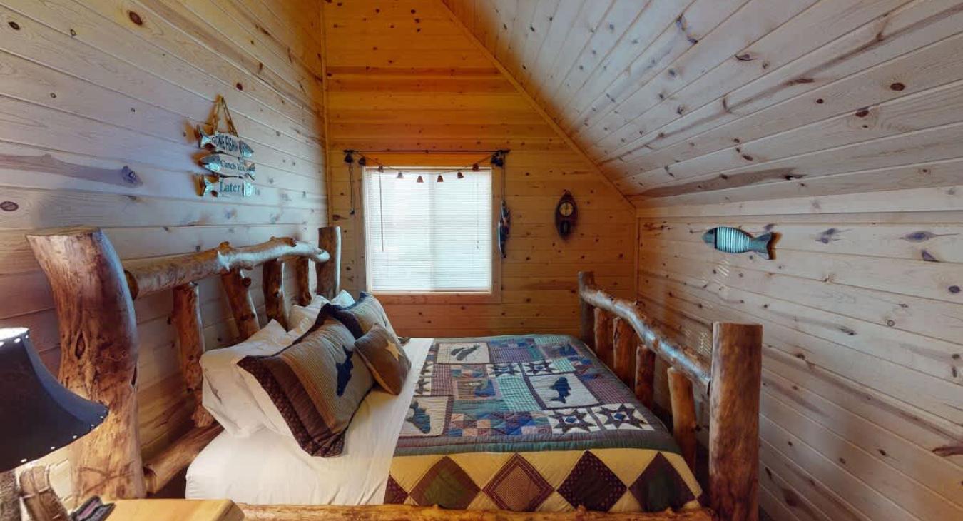 Bedroom #2 located upstairs with Queen size bed.