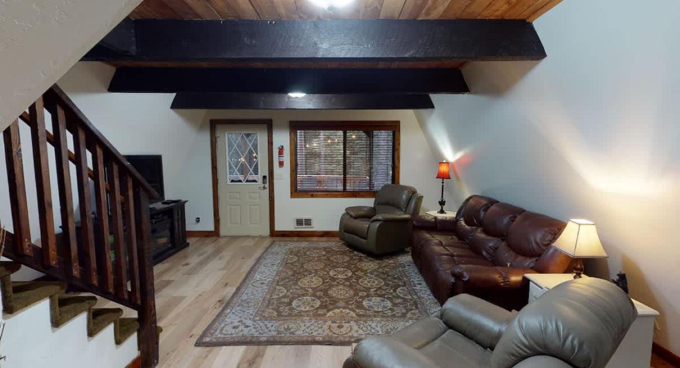 The living room is equipped with seating to relax after a long day.