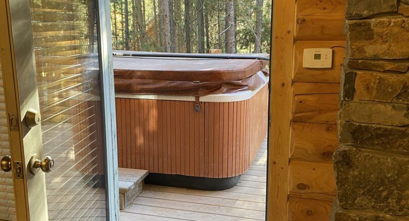 A private hot tub is also available on the deck.