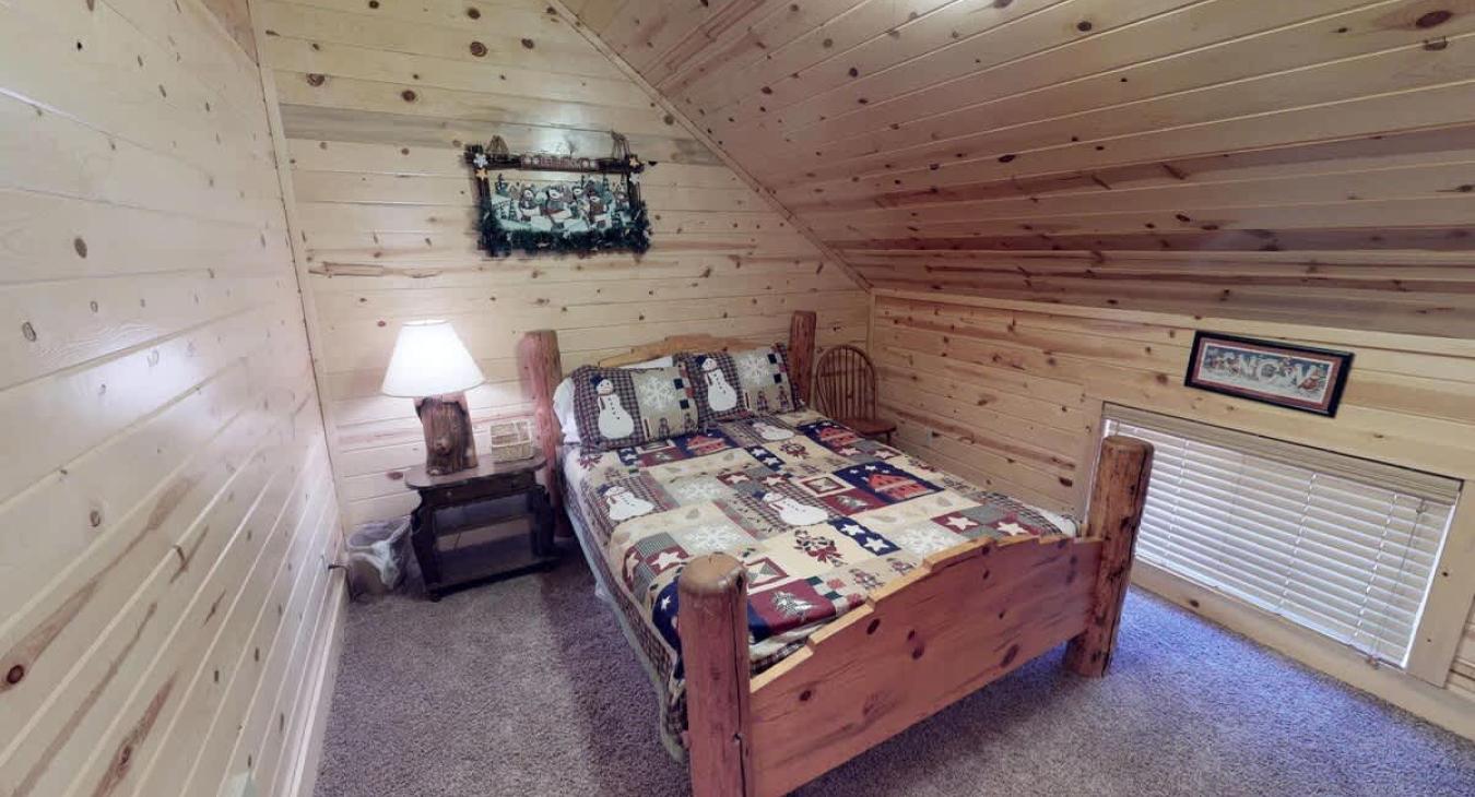 Bedroom #2 located upstairs with a Double bed.