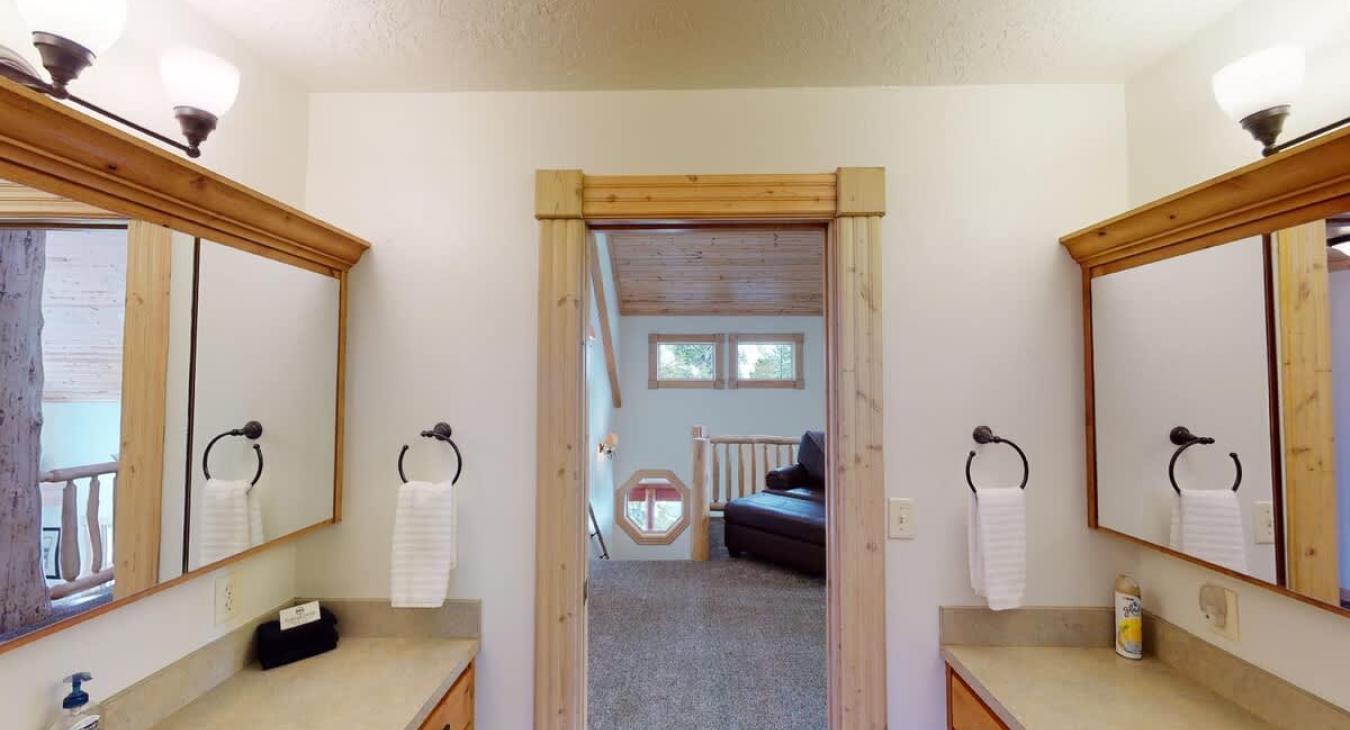 Easy access to the upstairs loft from this bathroom.