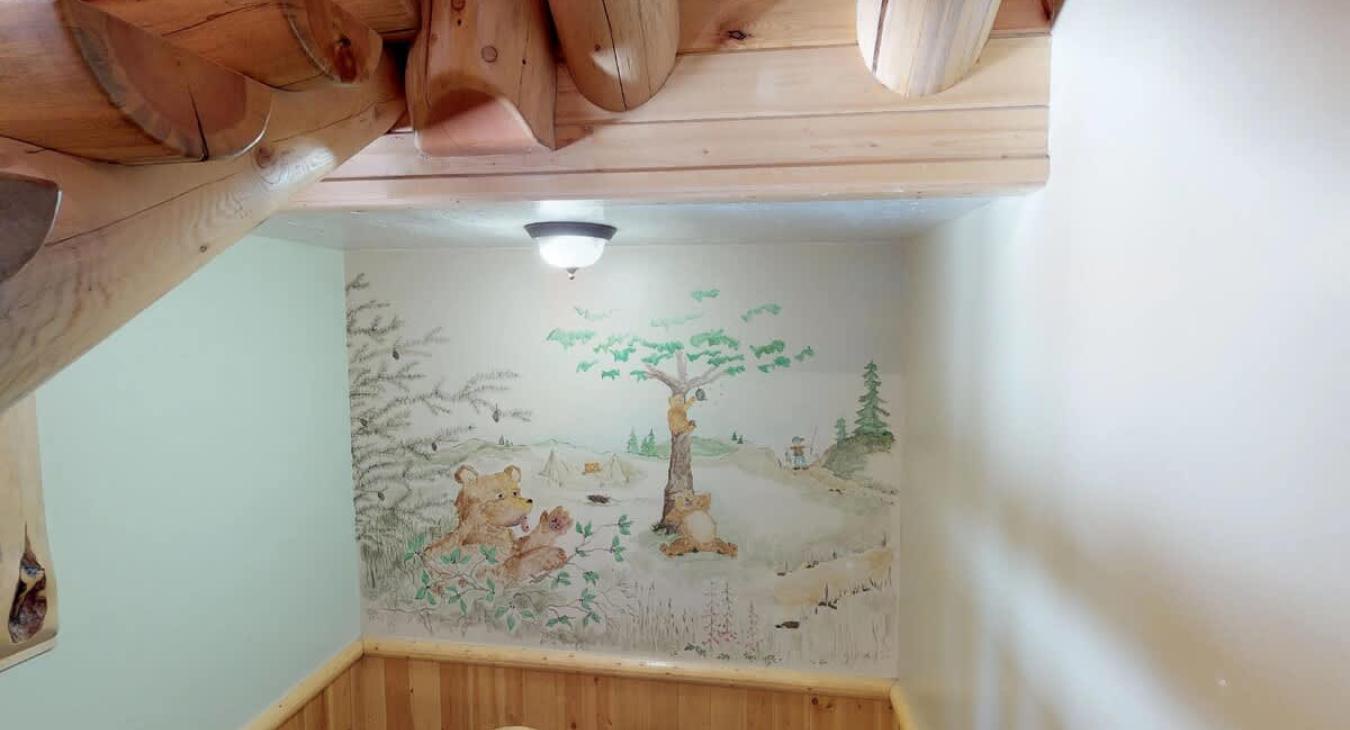 Beautiful hand painted drawing of a bear eating Huckleberries.