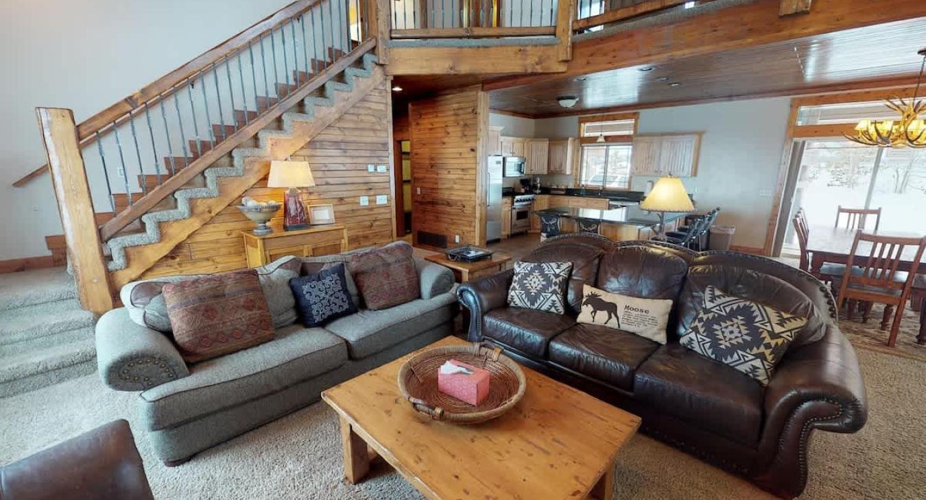 The living room offers a welcome environment to relax after a long day and connect with others.