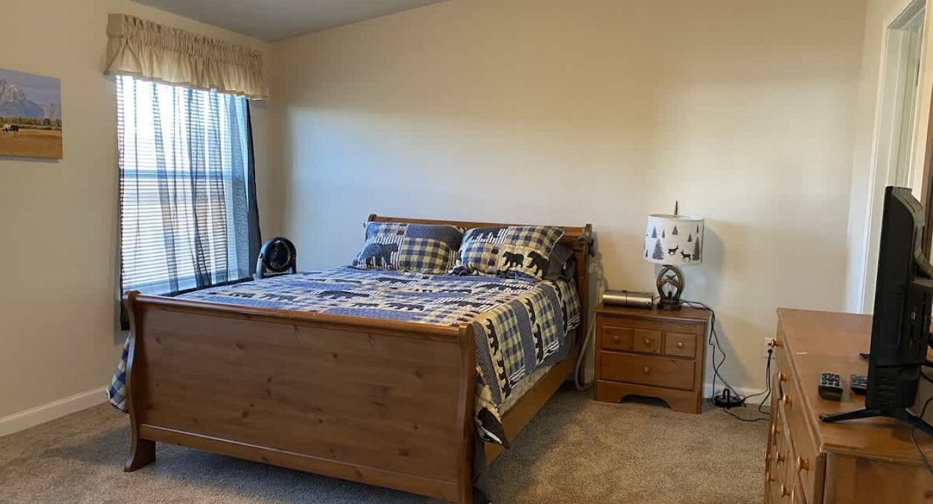 Master bedroom with a Queen size bed.