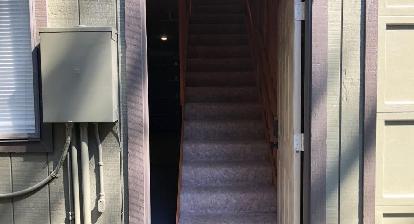 Stairs that lead up the cabin.