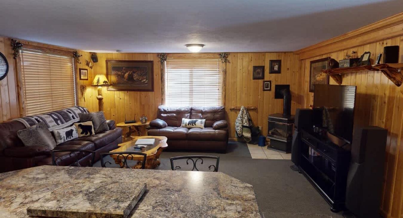 The living room seemingly flows into the kitchen making it easy to transition to different areas.
