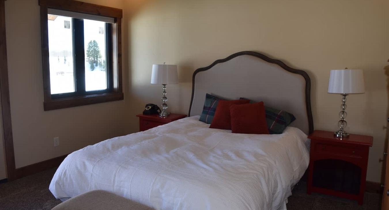 Master bedroom with a Queen size bed.