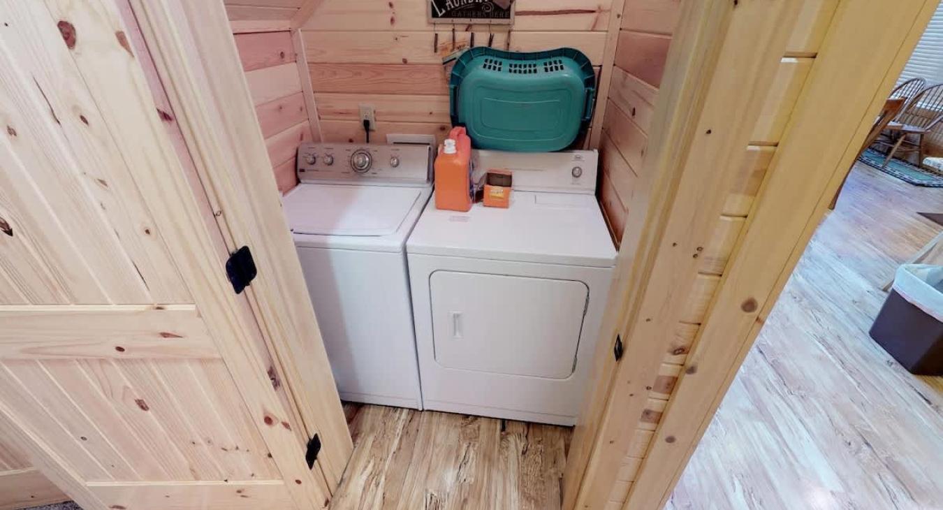 Full size washer and dryer on the main floor. Laundry soap is included.