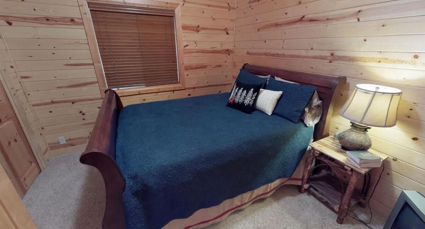 Bear Hollow also has another private bedroom with a queen bed.