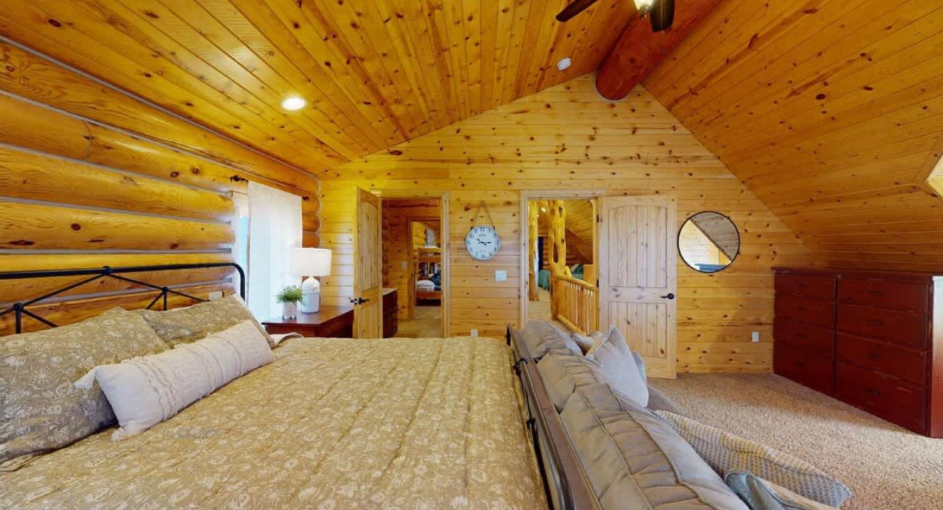 The room shares a bathroom with another room upstairs, which is conveniently located just through the door connected to the room.