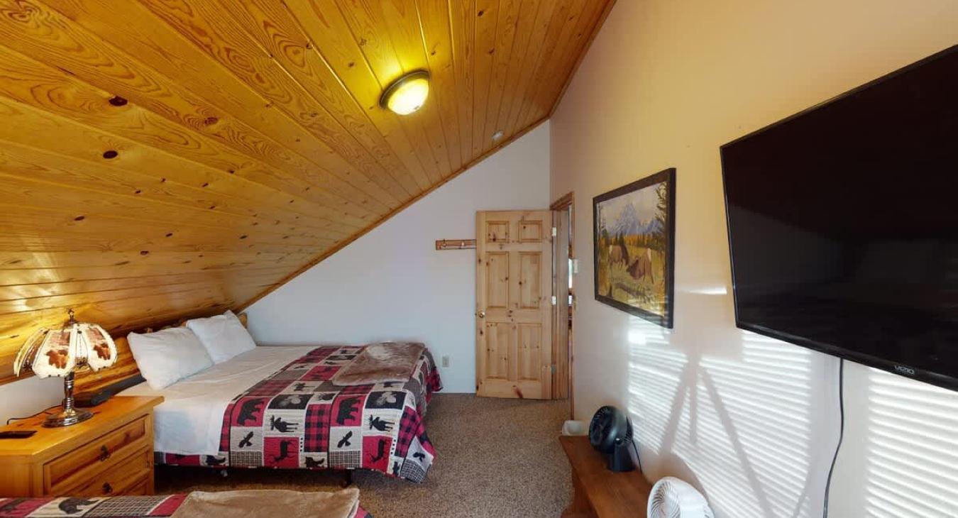 Bedroom #3 located upstairs.