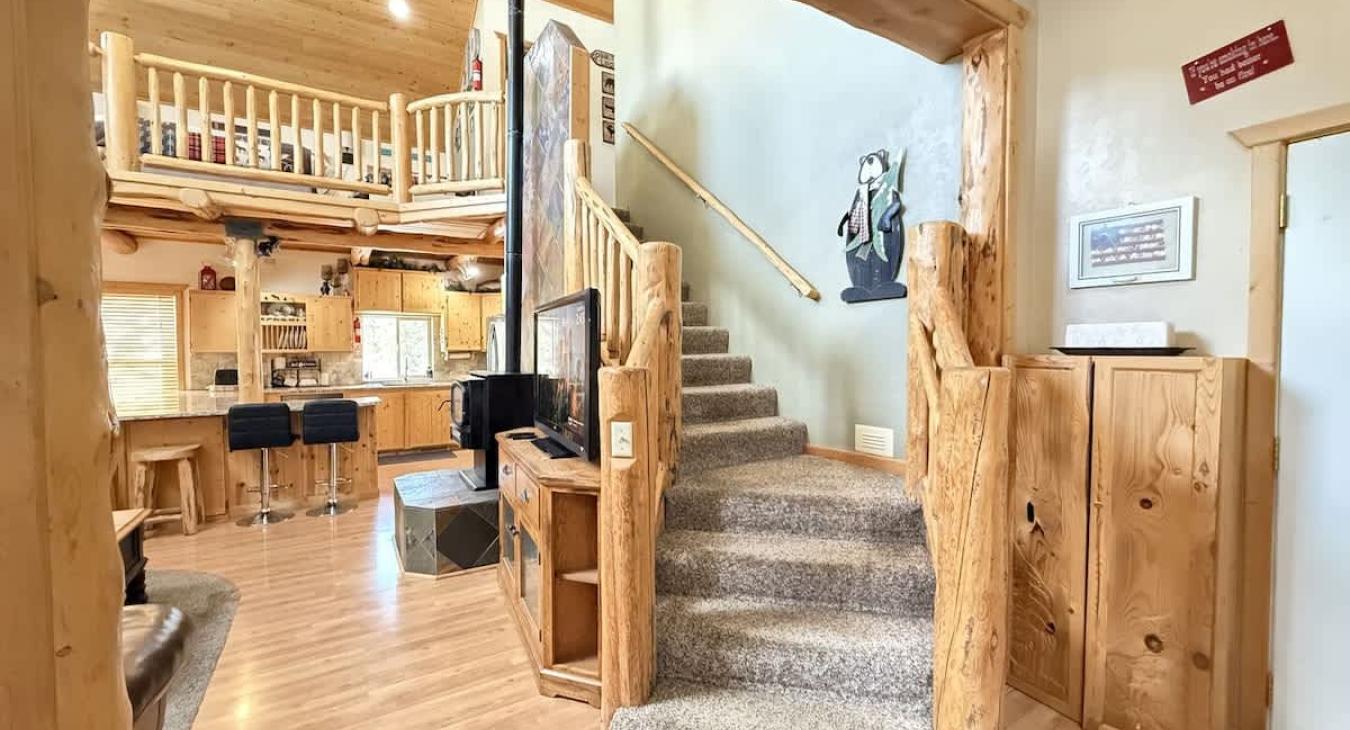 View of the stairs from the entry way.