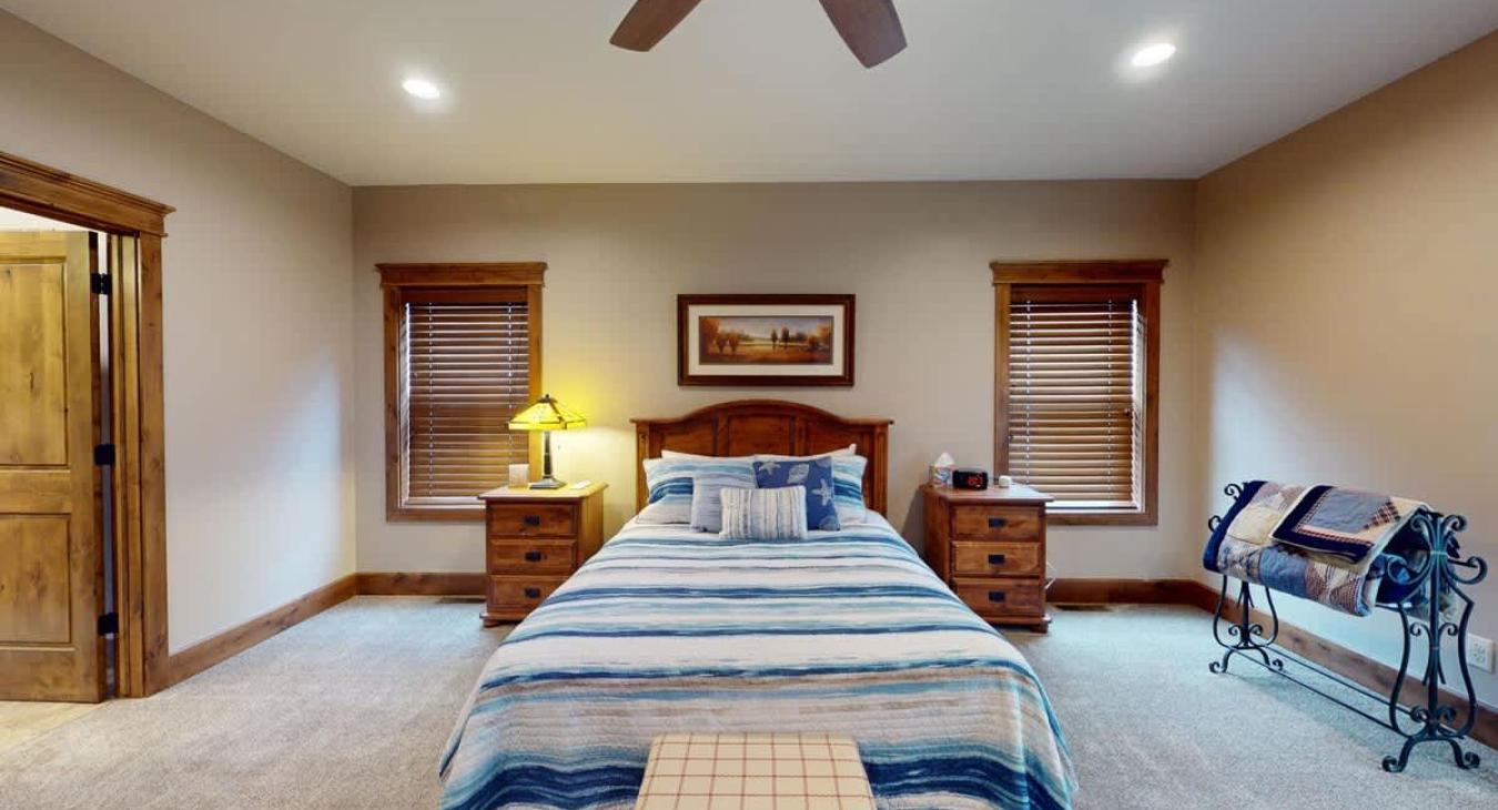 Main level master bedroom with a Queen size bed.
