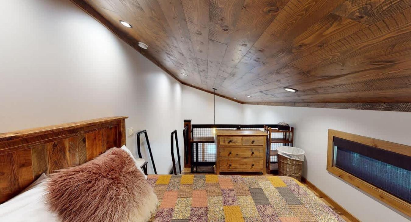 View from the loft bedroom space out into the living area.