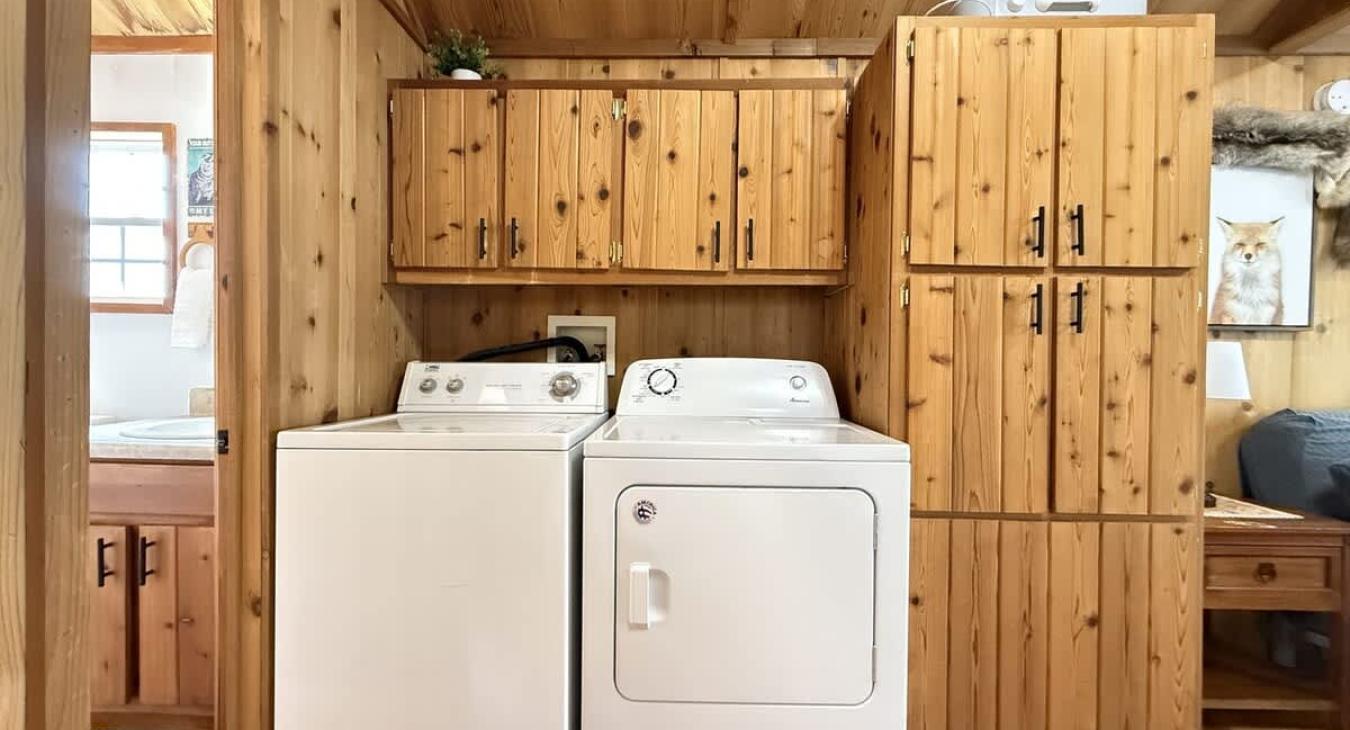 Full size washer and dryer with laundry soap is provided.