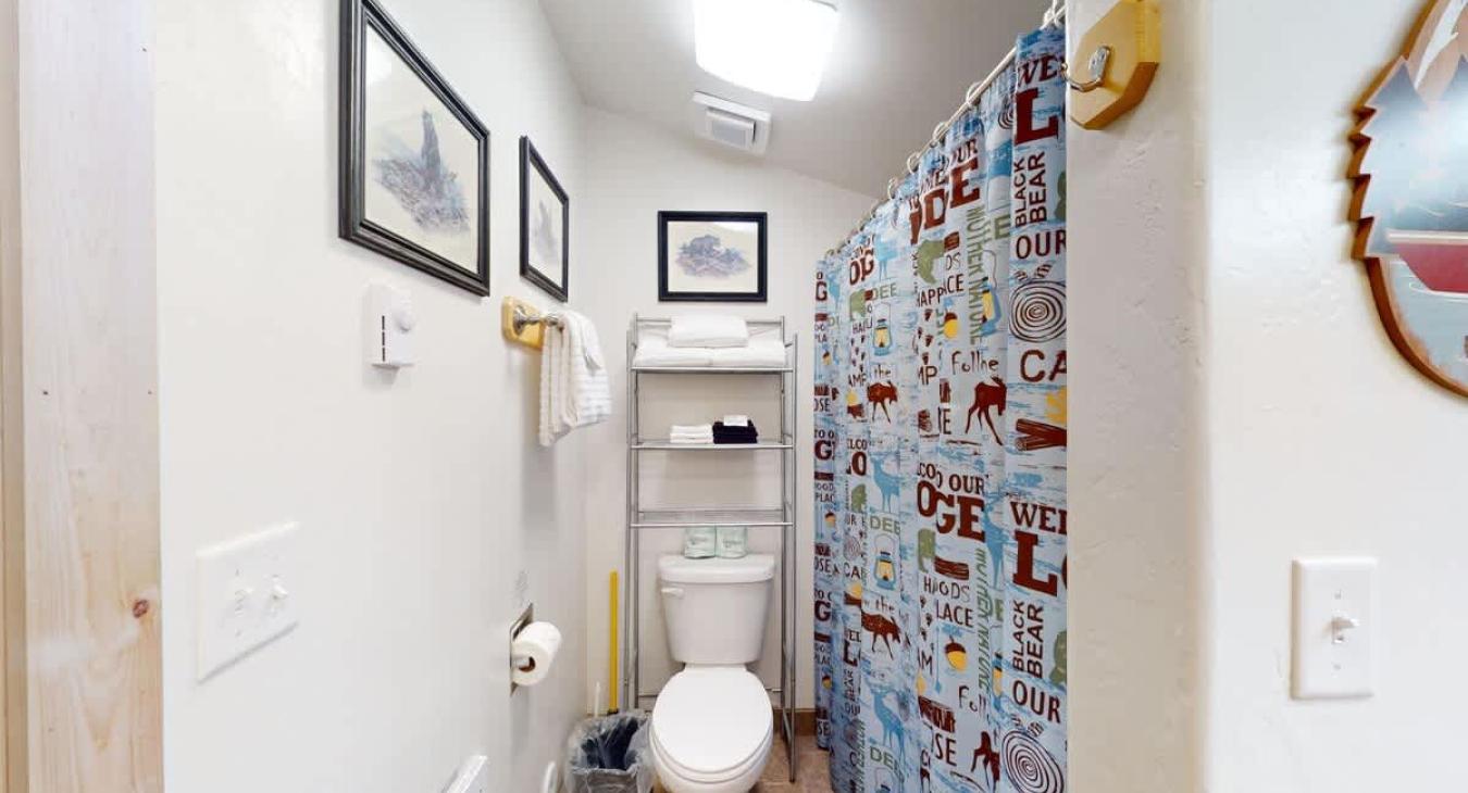 Storage is located in the bathroom for your belongings.