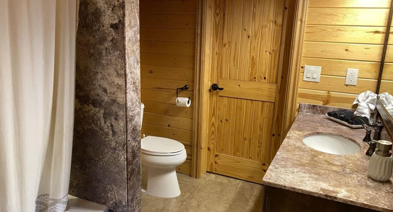 The beautiful stone accents of the cabin brings a modern feel while in the cabin.