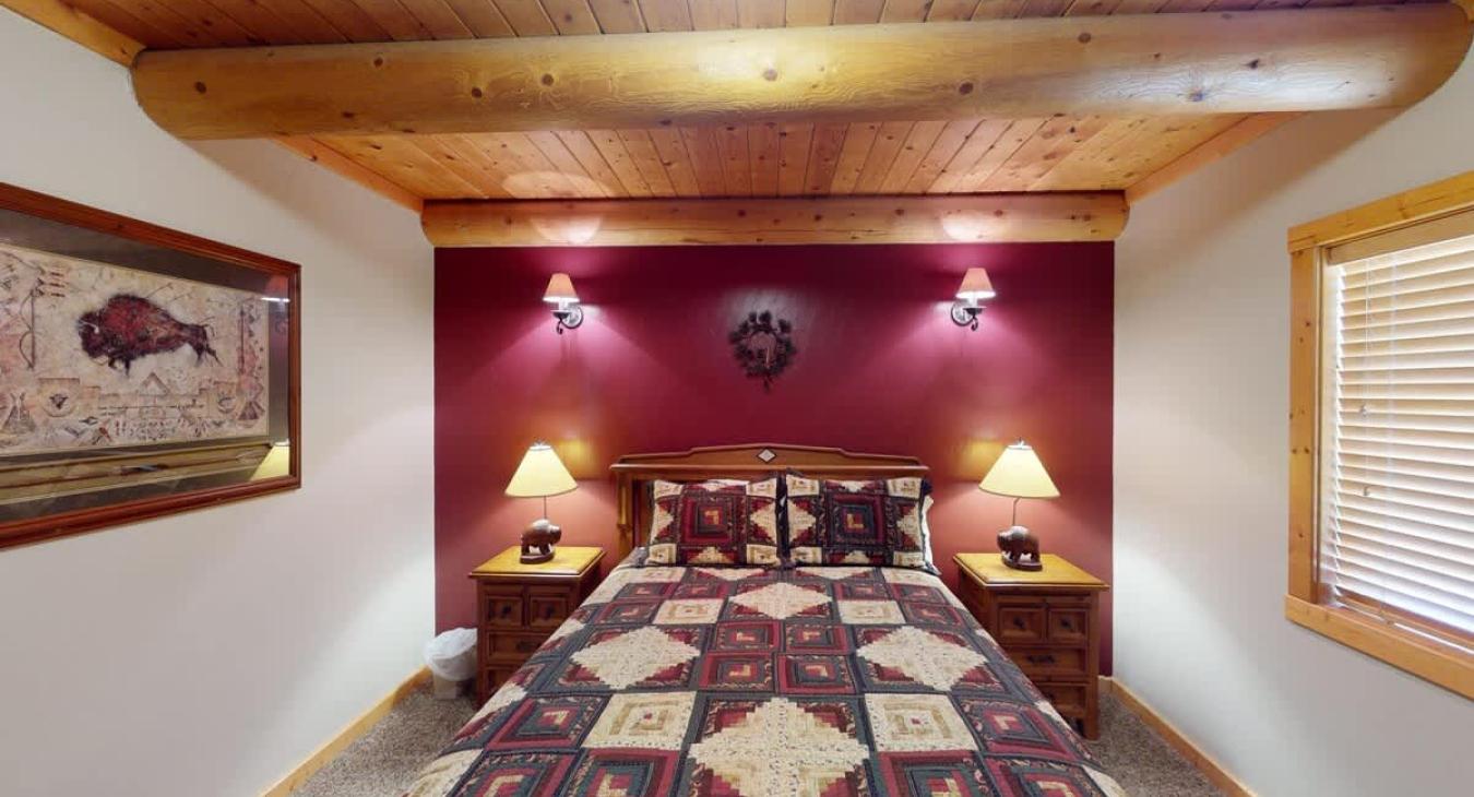 Downstairs bedroom #2 with a Queen size bed.