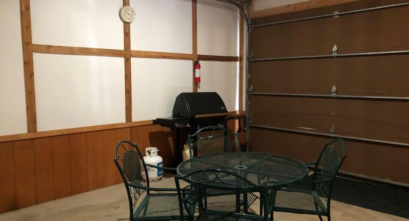Table and grill for you to use in the garage.