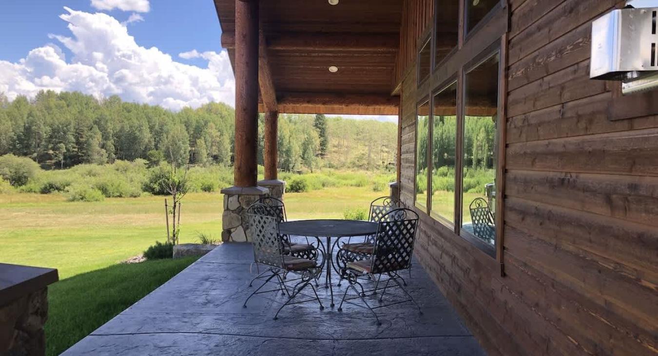 Beautiful deck of the cabin to look out on the beautiful landscape.
