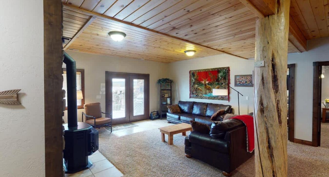 View of the living room from the 1st downstairs bedroom.