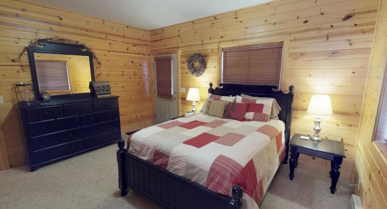 The master also has direct access to the deck and a dresser.