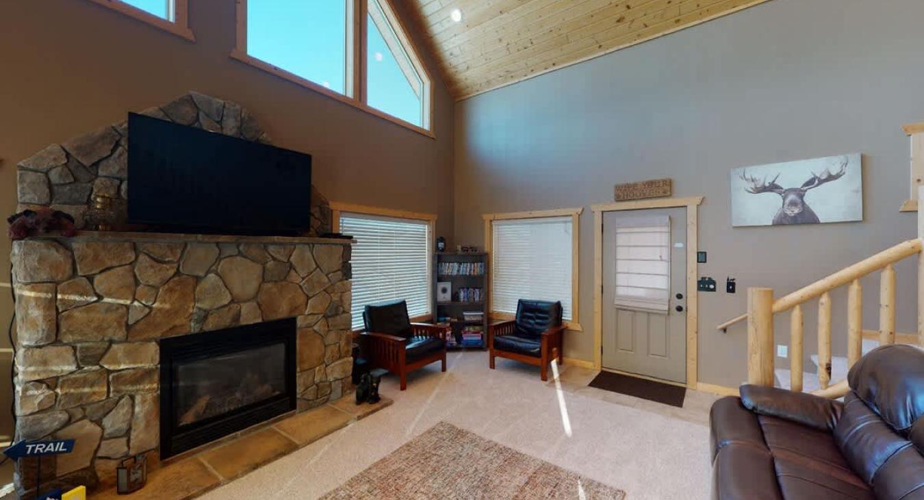 Cozy up by the fireplace after a long day, make sure to bring your own wood.