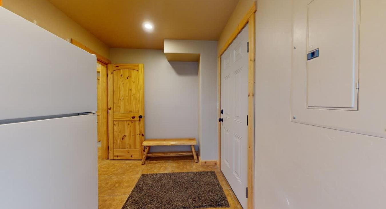 Mud room located downstairs.