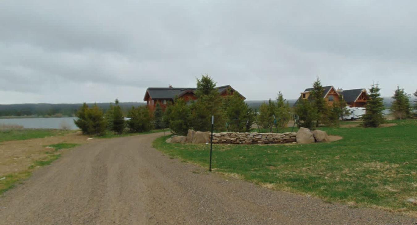 Large entry driveway for multiple vehicles.