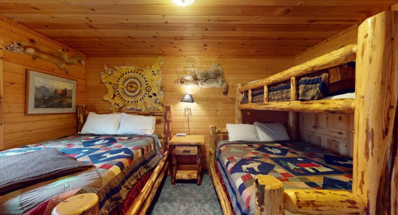 Bedroom #2 located upstairs with a Queen and Full.