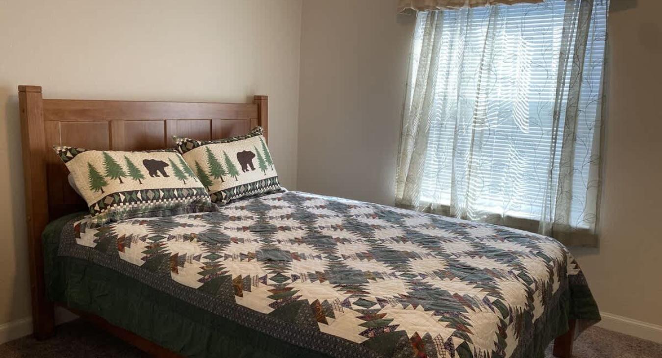 Bedroom #2 with a Queen size bed.