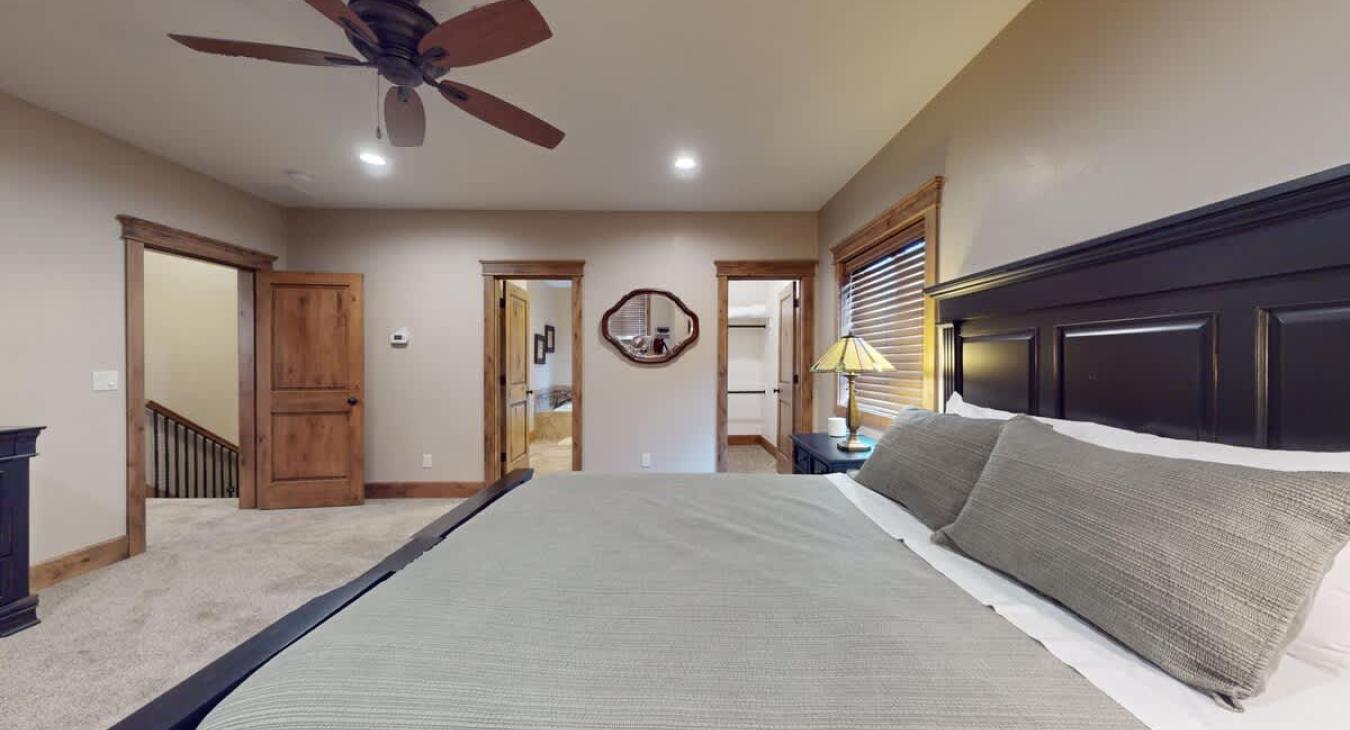 Upstairs master bedroom with walk in closet and ensuite bathroom.