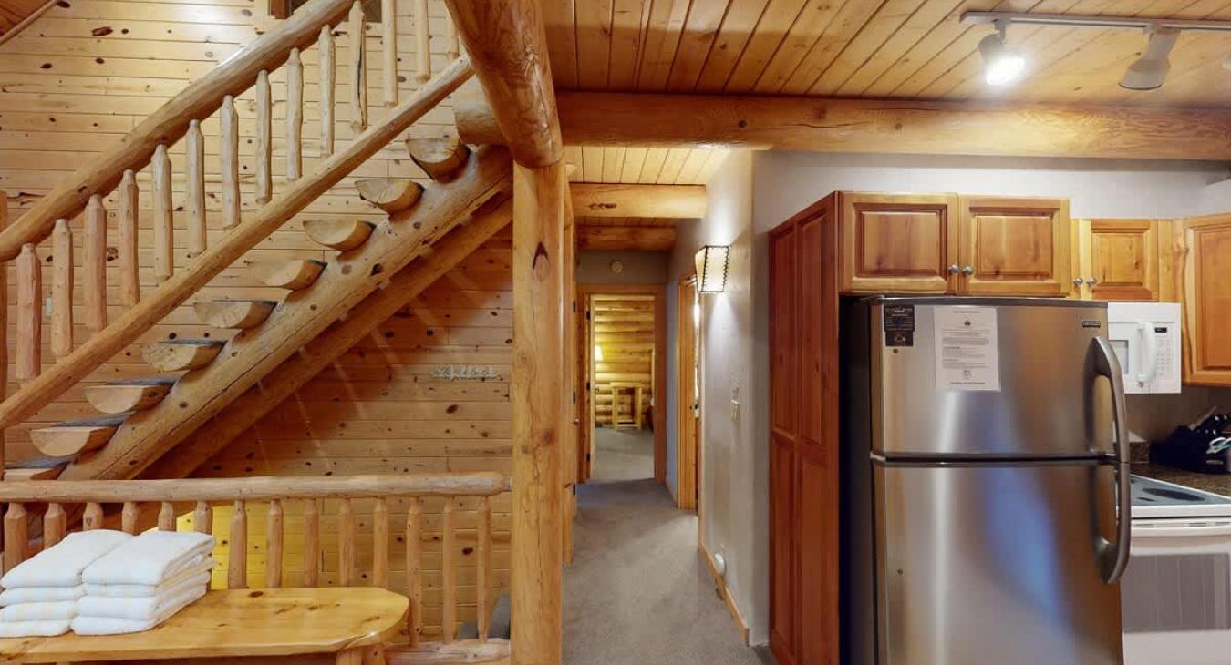 Hallway from the kitchen to access the other rooms on the main level.